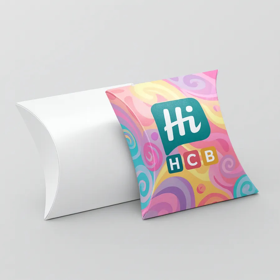 Wholesale pillow boxes including a plain white version and one with colourful swirls and HCB branding- class=